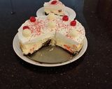 A picture of step 25 of White Chocolate Cherry Truffle Cheesecake.