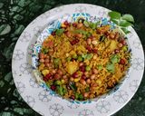 A picture of step 4 of Red Poha Masala With Veggies, Sprouts and Nuts.
