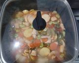 Foto del paso 7 de la receta: Pollo a la portuguesa con habas