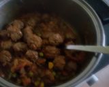 A picture of step 2 of Rice and beef rounds in sauce.