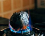 A picture of step 1 of Baingan bharta.