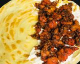 A picture of step 3 of Malabar paratha chicken sandwich.