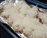 Foto del paso 6 de la receta: Patatas rellenas con pollo y pimientos