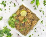 A picture of step 12 of Chicken hara masala.