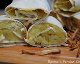 A picture of step 13 of Persian mashed potato wrap.