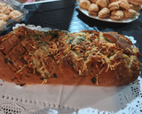 Foto del paso 4 de la receta: Pan con queso y mantequilla de ajo 😋