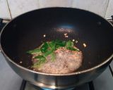A picture of step 3 of Raw Papaya Thoran !.