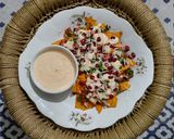 A picture of step 9 of Cheesy nachos with salsa.