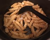 A picture of step 3 of Cheese burger salad.