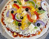 A picture of step 6 of Cheesy Veg Pizza.