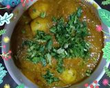 A picture of step 4 of Dum ALU and methi makai puri.