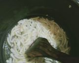 A picture of step 5 of Achari aloo gobhi.