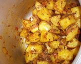 A picture of step 7 of Alu ki tarkari.