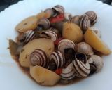 Foto del paso 3 de la receta: Patatas al vapor con caracoles