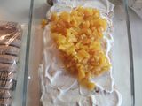 Postre de durazno, vainilla, crema y merengue