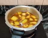 A picture of step 9 of SPICY HING LAUKI with COCONUT...