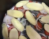 A picture of step 4 of Stuffed Zucchini and Grape Leaves with Vegetables.