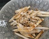 A picture of step 1 of Asian style celeriac matchstick chips.