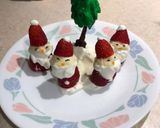 A picture of step 4 of Strawberry Santas 🎅 🌲.