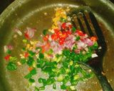 A picture of step 4 of Vegetable stir fried rice with sausages.