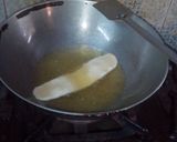 A picture of step 28 of Sugar coat khaja.
