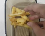 A picture of step 5 of Restaurant style cheese fries.