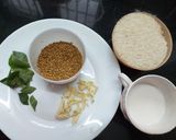 A picture of step 1 of Coconut Milk Garlic Rice.