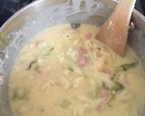 A picture of step 6 of Cauliflower Cheese with Bacon bits.