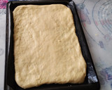 Foto del paso 4 de la receta: Coca de San Juan de Naranja confitada, crema pastelera y piñones
