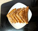 A picture of step 6 of My Melted Cheese & Red Onion Toasted Thins.🥰.