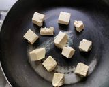 A picture of step 2 of Spicy Tofu - Tuna with Stir fry Spinach.