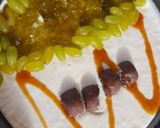 A picture of step 5 of 3 layered Cadbury and kiwi grapes Cheese cake 2 in 1.