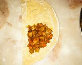 A picture of step 27 of Fateera with hotdog filling.