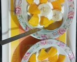 A picture of step 3 of ICE CREAM 🍦with mango toppings.