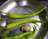 A picture of step 2 of Baingan bharta with spring onion.