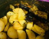 A picture of step 6 of Aloo Baingan.