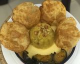 A picture of step 8 of Simple Navratri Thali: Puri, Begun Bhaja & Halwa.
