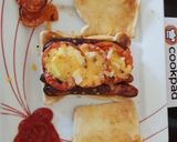 A picture of step 3 of My Sausage, Tomato, Cheese + Onion Toast. 😁.