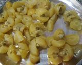 A picture of step 2 of Amla Pickle.