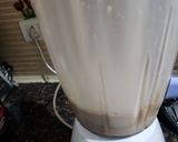 A picture of step 4 of Hershey's chocolate and cocoa milk shake.