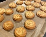 A picture of step 7 of Rhubarb jam piped biscuits ❤️.