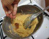 A picture of step 3 of Besan laddo with gud powder.