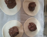 Foto del paso 3 de la receta: Bollitos de hojaldre rellenos de chocolate