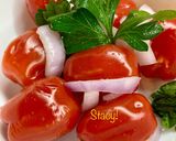 A picture of step 4 of Tomato, Parsley, and Onion Salad.