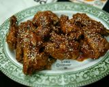 A picture of step 7 of Spicy wings with sauce.
