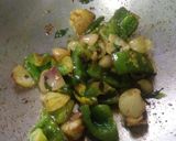 A picture of step 3 of Chettinad fish fry with veggie.