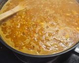 Foto del paso 7 de la receta: Arroz meloso de gambitas, calamares y pescadito