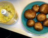 A picture of step 1 of Spaghetti Alfredo w Baby Bellas w sauteed garlic & onions.