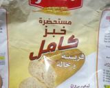 صورة لخطوة 1 من وصفة خبز الدقيق الكامل
