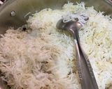 A picture of step 5 of Green Thai curry with steamed rice.